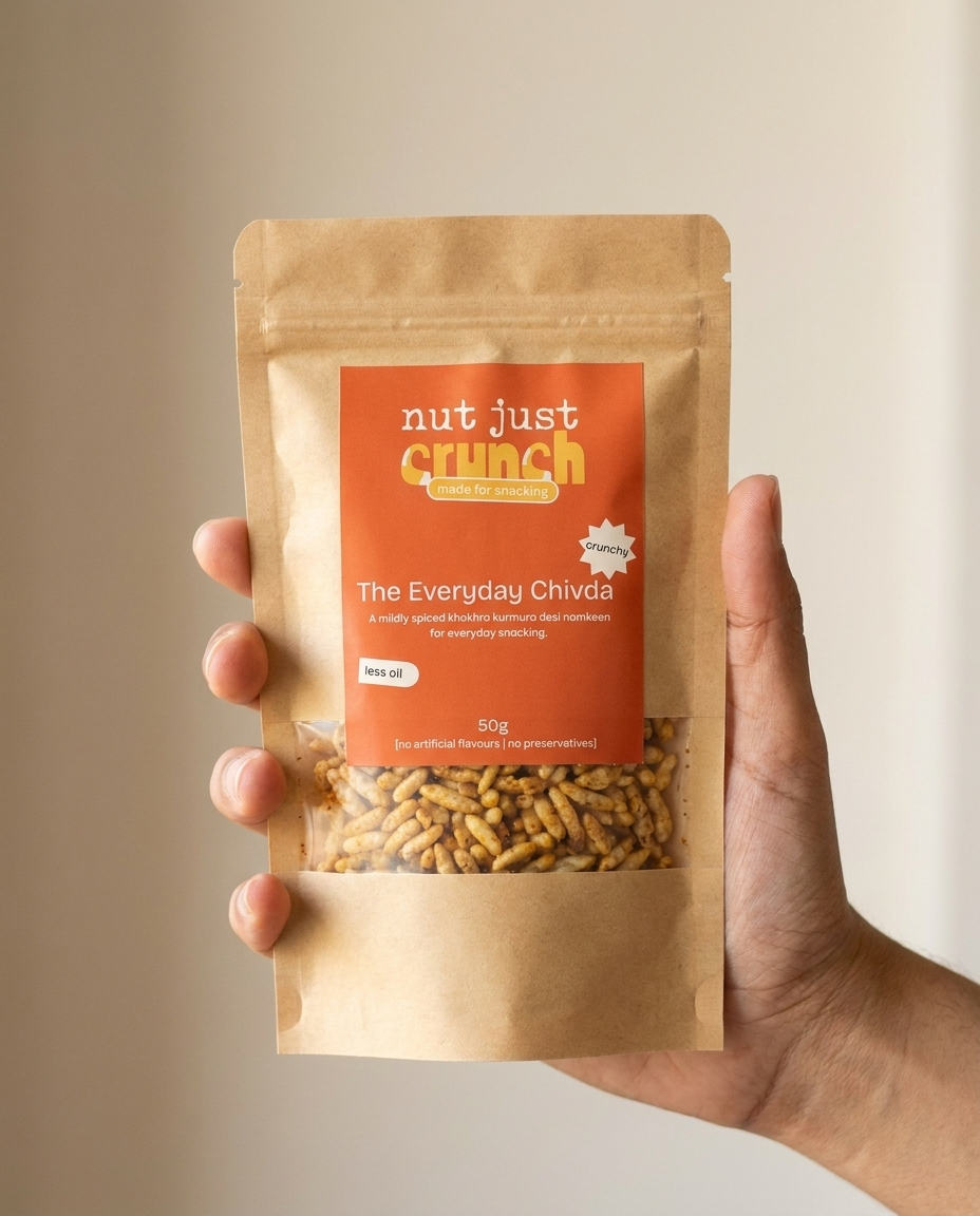 A single 50 g Everyday Chivda pouch held in one hand