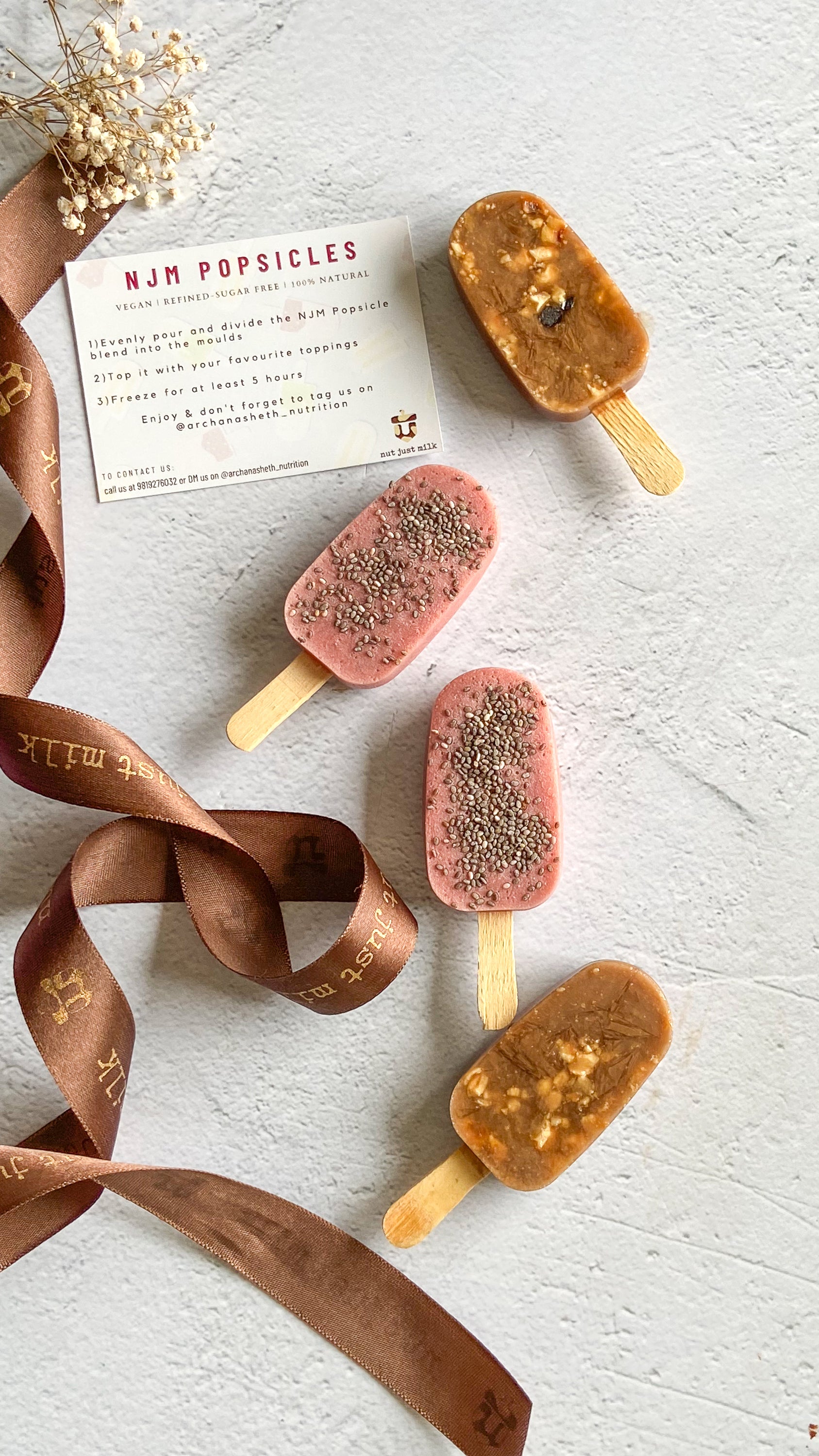 Finished NJM popsicles with the instruction card and ribbon